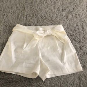 Express high rise white shorts with tie. NWOT